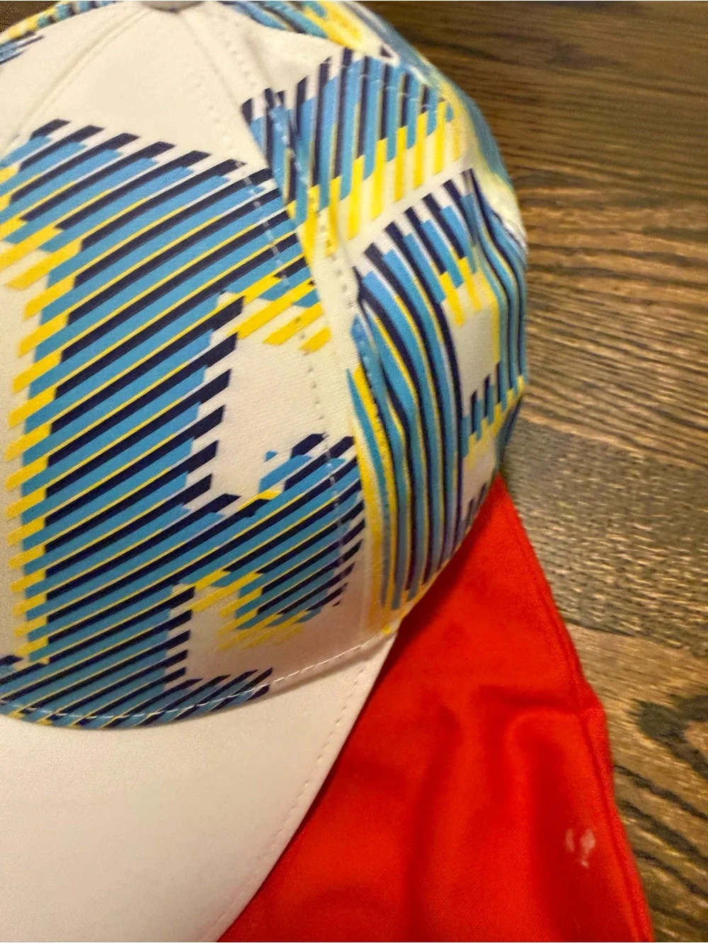 Scuderia Ferrari White Cap with Blue and Yellow Graphics